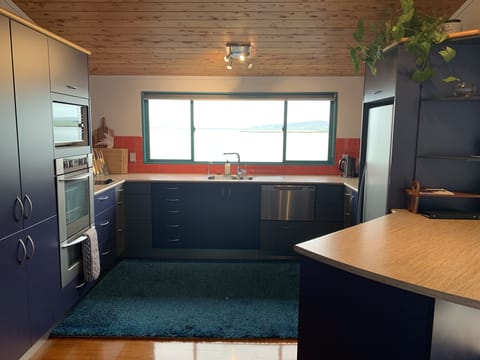 Kitchen - window looks out to the harbour