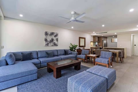 Open plan living is ideal for entertaining, with a large L-shaped lounge inviting you to kick back and relax after a day at the pool.