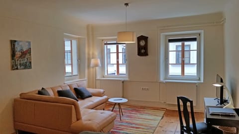 Living area with sofa bed, size 130 x 180 cm, LCD TV, writing desk