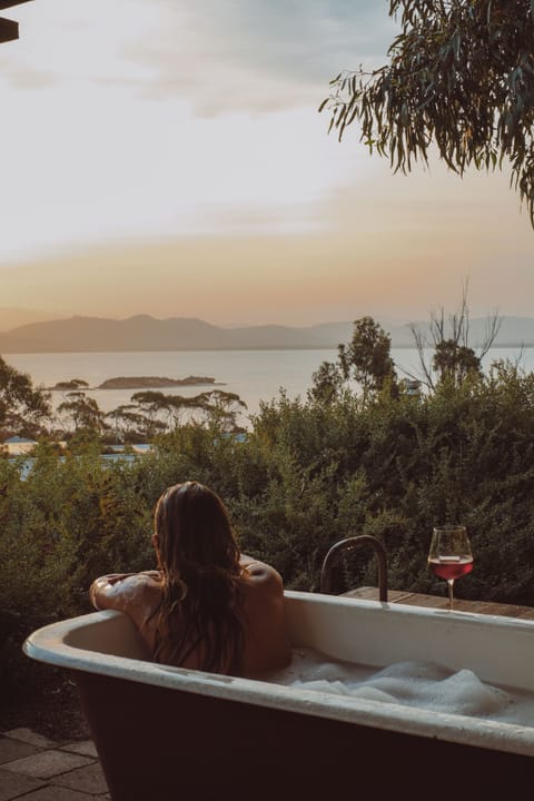 The outdoor bath and shower, with view towards Mt Wellington/Kunyani