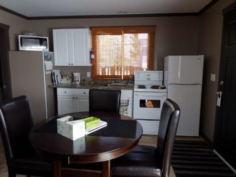Kitchen 3 Bed Suite | Private kitchen | Full-size fridge, microwave, stovetop, coffee/tea maker