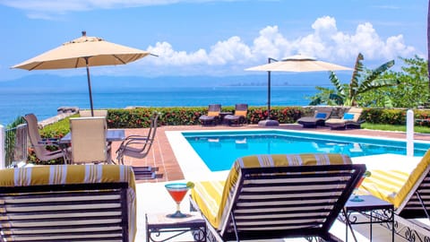 Enjoy a drink in your private tarrace and swimming pool