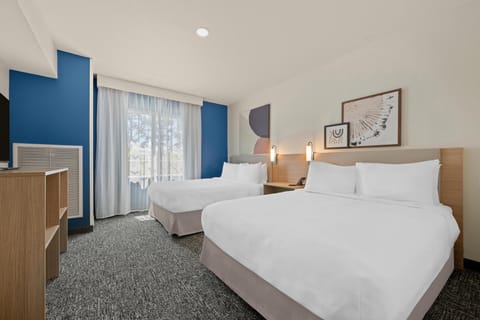 Desk, laptop workspace, blackout drapes, iron/ironing board