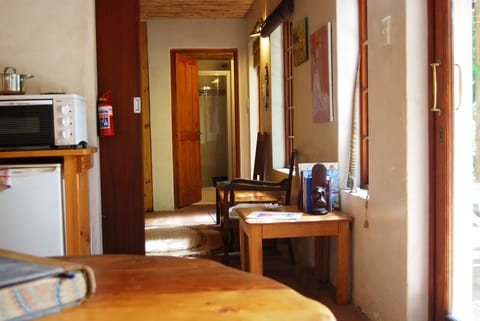 Back there is the shower-room, with wash-basin, toilet. Don't forget: drought.