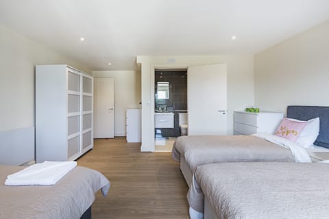 Bedroom 1 with Ensuite
I large Double bed with 3 single beds 