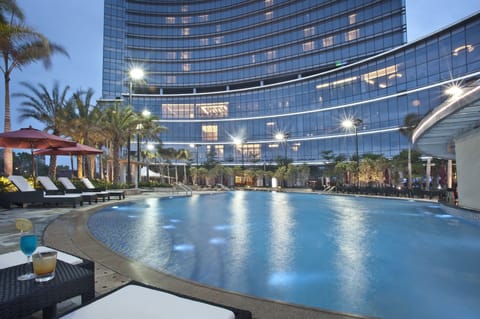 Indoor pool, outdoor pool, open 6:00 AM to 10:00 PM, pool umbrellas