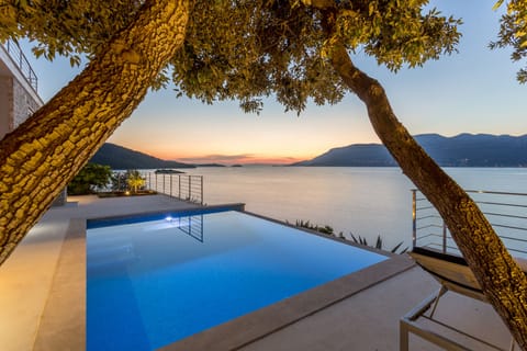 Seasonal outdoor pool, an infinity pool, sun loungers