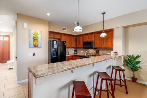 Granite bar with seating.