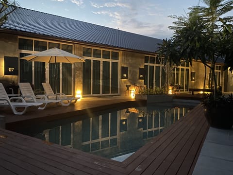 Outdoor pool, open 9:00 AM to 8:00 PM, pool umbrellas, sun loungers