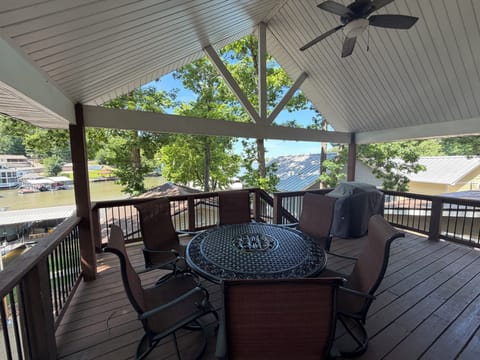 Covered deck overlooks Lake. Enjoy your morning coffee/grill out/watch sunsets