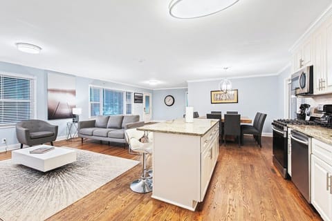 Open kitchen with convenient island bar, modern appliances