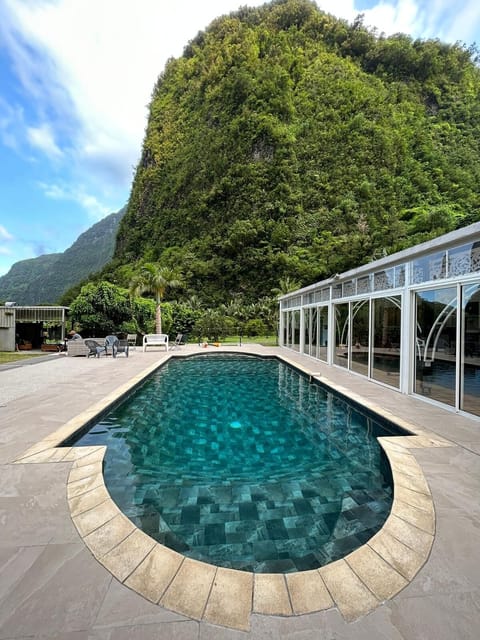 Outdoor pool, open 9:00 AM to 6:30 PM, pool umbrellas