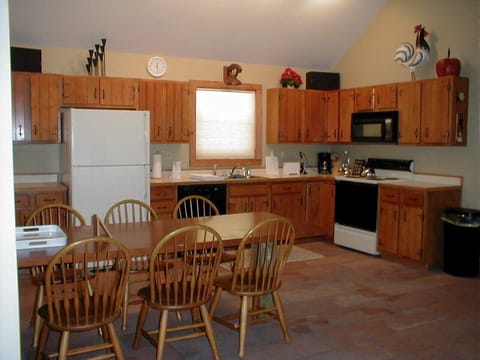 Full kitchen with dining area