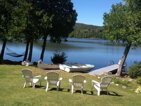Rock the afternoon away in the hammock, listening to the gentle lap of the water