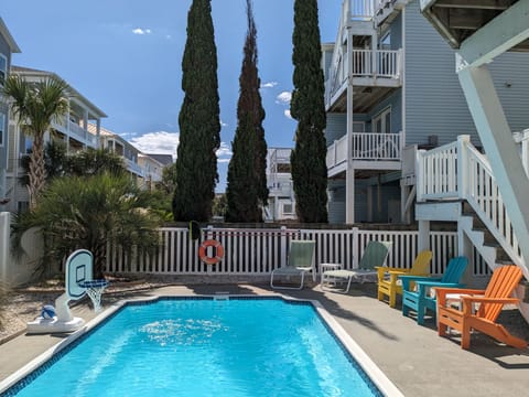 Pick a seat, take a swim, shoot some hoops anytime at the 22ft swimming pool! 