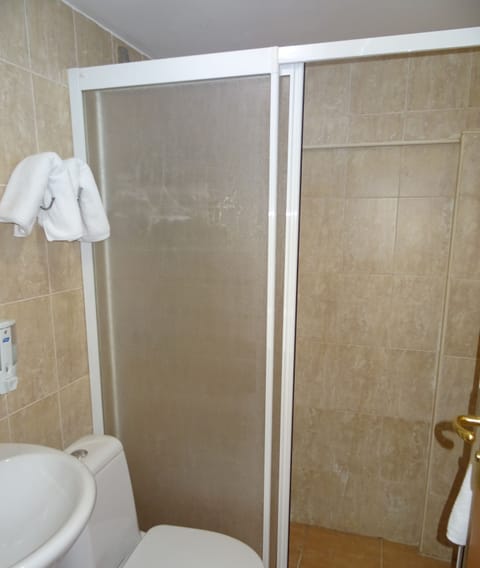 Ground floor Room (Without a Window) | Bathroom | Shower, free toiletries, hair dryer, towels