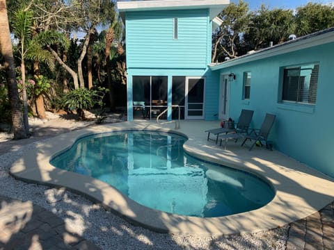 View of new backyard pool and back porch