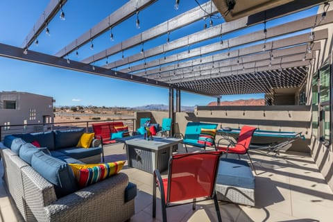 Upstairs Patio - Large deck has a great view, plenty of seating, two hammocks and a gas fire pit.