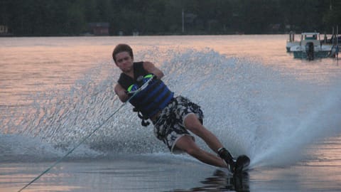 Skiing in front of house