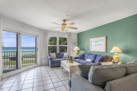 Relax with the Gulf in view through the balcony doors.