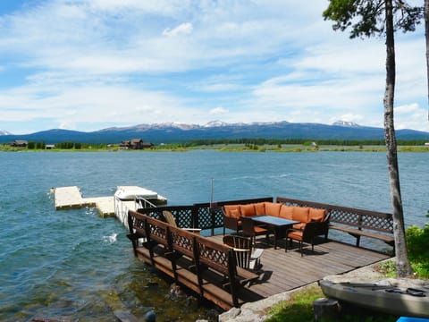 Deck with comfortable seating, and dock, right on the Island Park Reservoir!