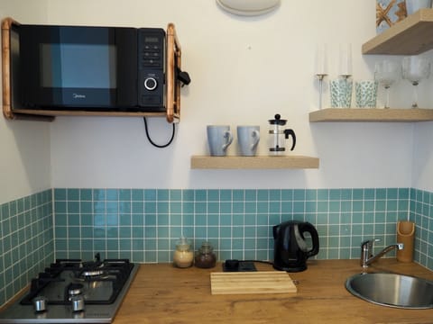 Deluxe Double Room | Private kitchen | Fridge, coffee/tea maker, electric kettle, highchair