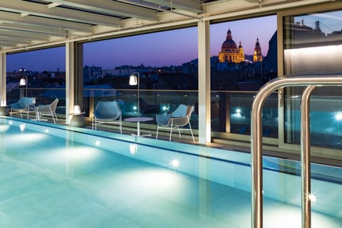 Indoor pool, open 6:00 AM to 10:00 PM, sun loungers