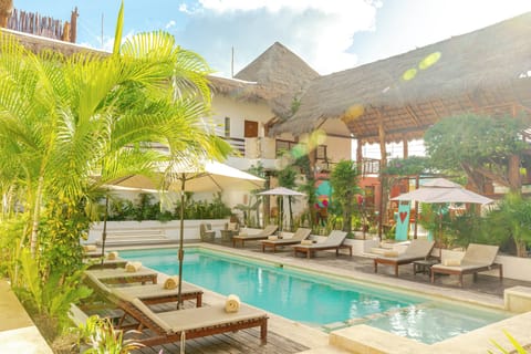 Outdoor pool, open 8:00 AM to 11:00 PM, sun loungers
