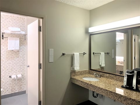 Eco-friendly toiletries, hair dryer, towels