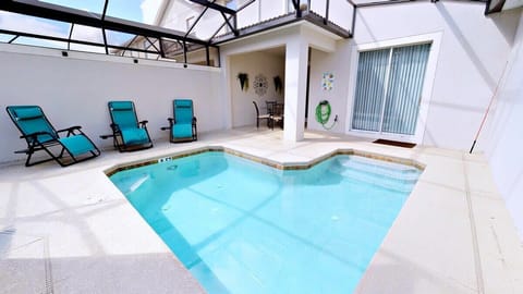 Private screened pool with loungers