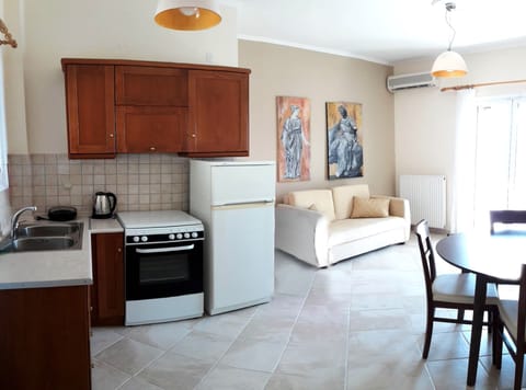 Apartment, 2 Bedrooms, Sea View (02) | Private kitchen | Full-size fridge, oven, stovetop, coffee/tea maker