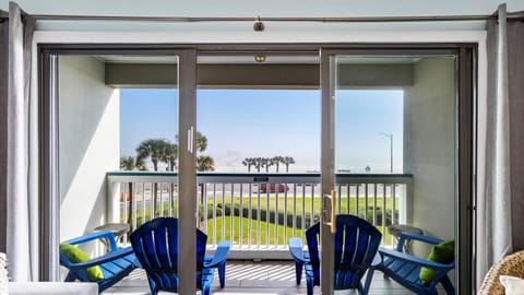 Wake to Gulf sunrises from your private top-floor balcony in Galveston.