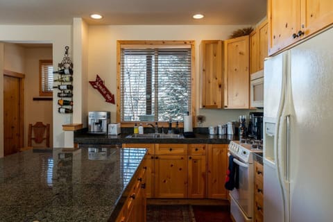 Kitchen with:
-Cusinart drip coffee maker 
-De'Longhi Super Automatic Espresso/Coffee Machine
-Nespresso VertuoLine coffee maker (pods provided) 