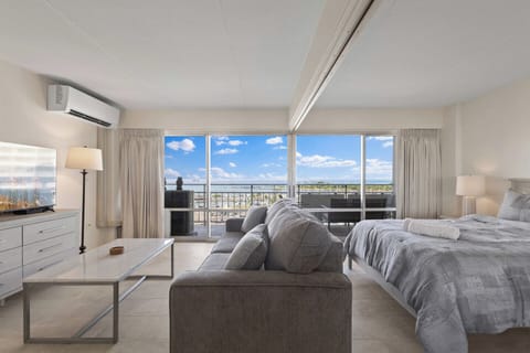 Living Room - Split A/C to keep you cool and comfortable in your living room and bedroom.  Rooms can be divided with a privacy screen/door if more privacy is needed.