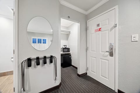 Premium bedding, down comforters, memory foam beds, in-room safe