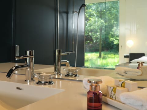 Shower, bathrobes, slippers, towels