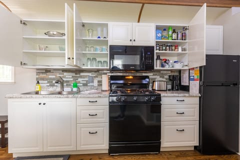Enjoy cooking your own meals with a fully stocked kitchen!