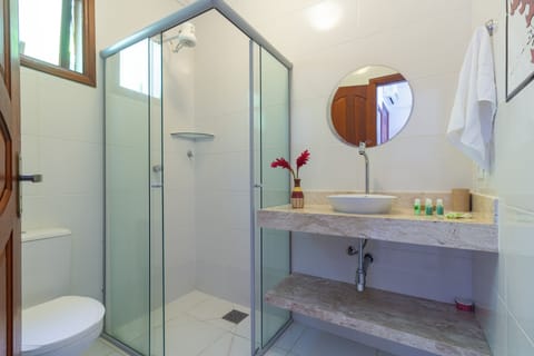 Premium Quadruple Room, Ocean View | Bathroom | Shower, free toiletries, hair dryer, towels