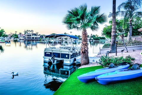 Experience beautiful Val Vista Lake sunshine and sunsets