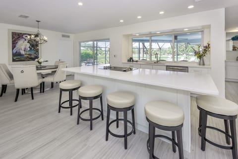 Island bar top counter with swivel barstools