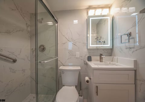 Guest Bath has a Walk In Shower