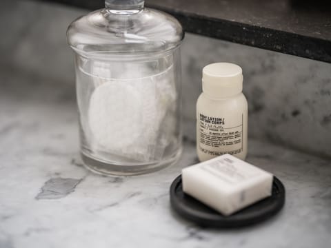 Designer toiletries, hair dryer, bathrobes, slippers