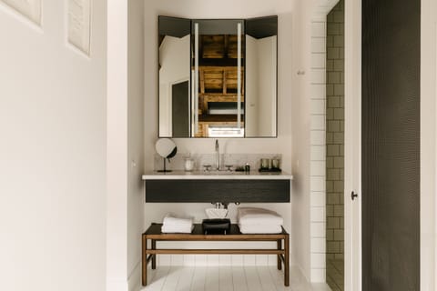 Designer toiletries, hair dryer, bathrobes, slippers