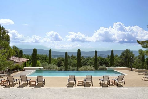 Outdoor pool, a heated pool, sun loungers