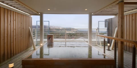 Unkai Suite | Bathroom | Hydromassage showerhead, hair dryer, bathrobes, slippers