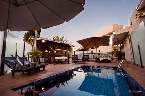 Outdoor pool, open 10:00 AM to 10:00 PM, sun loungers