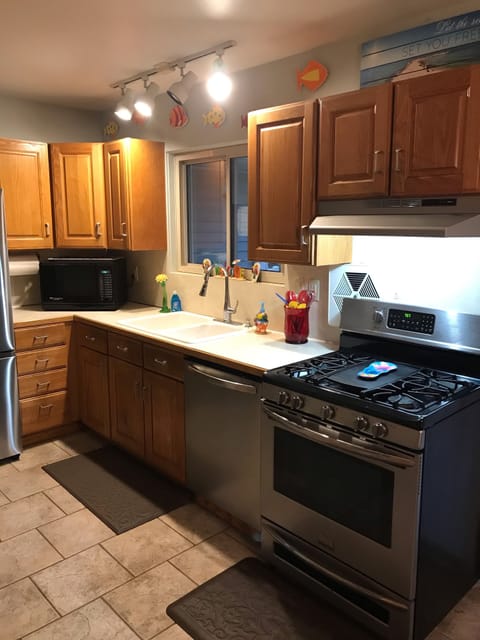 Kitchen with window over looking park like back yard