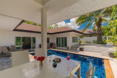 Private swimming pool and outsite sitting area