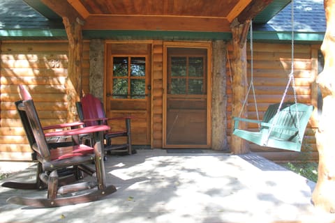 Relaxing Front Porch with Swing and Rockers