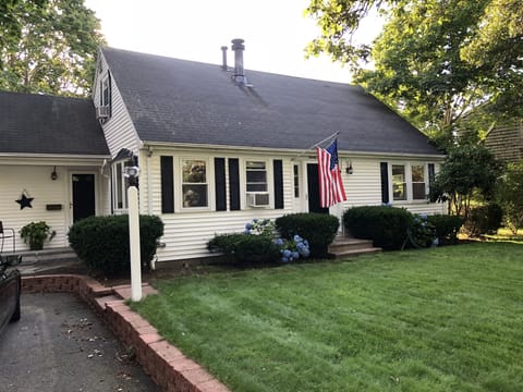 Front of House with Partial Driveway 